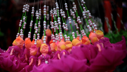 Fototapeta premium baby doll girls in knitted dress on isolated black background.