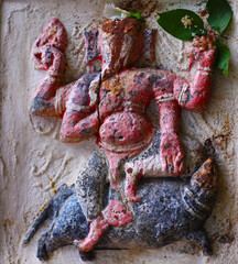Ancient sculpture of the Indian god Ganesha made of stone