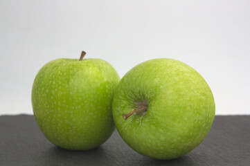 Green apples with white background and copy space