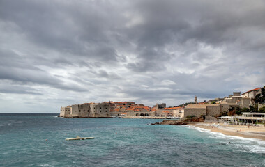 Fototapeta na wymiar Cloudy sky with rain over Old town Dubrovnik, Croatia