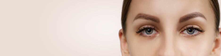 Eyelash Extension Procedure. Beautiful Woman with Extreme Long False Eyelashes. Makeup, Cosmetics. Beauty, Skincare.