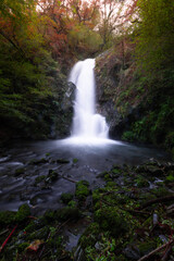 Fototapeta premium Erroiarri waterfall at Aaiko Harriak Natural Park, Artikutza, Basque Country.
