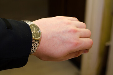 Businessman looking at his watch