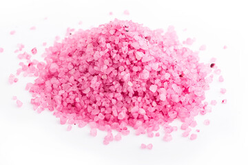 Fototapeta na wymiar Pink sea salt on a light background. Spa concept, relaxation at home