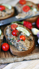 Open sandwiches of rye bread with homemade pate. Rustic style.