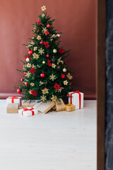 decoration decoration garland Christmas tree with gifts for the new year interior