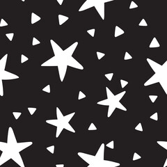 Obraz premium Stars and triangles doodles seamless pattern. Background texture.