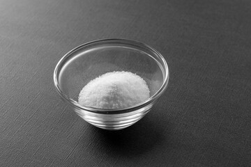 food salt in a glass transparent plate