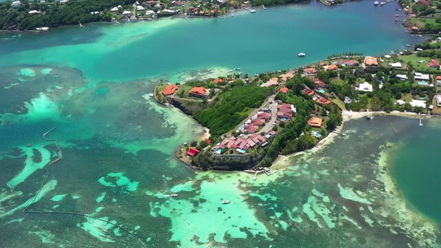 luxurious residential houses aerial shot blue lagoon Martinique beachfront resorts