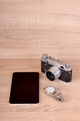 Items for blogger on wooden table