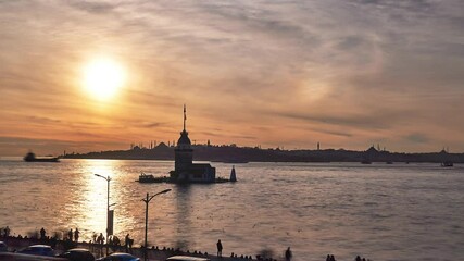 Beautiful cloudy sunset / evening at Bosphorus, Istanbul, Turkey. Timelapse clip with Maiden Tower, boats and landmarks of Istanbul 