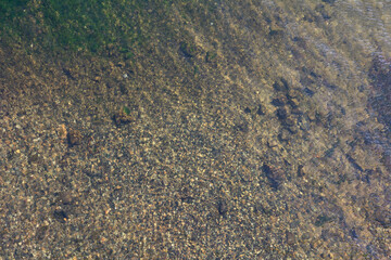 Transparent water of Lake Baikal top view.