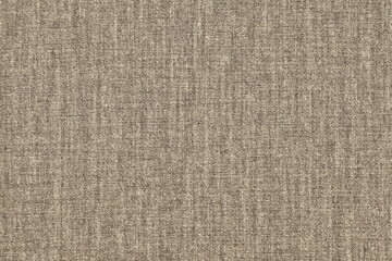 Fototapeta na wymiar Texture of coarse natural cotton fabric. Rough sacking of brown color.