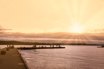 Fototapeta premium Swy-A-Lana Lagoon Fishing Pier during a sunrise . Nanaimo, BC, Canada.