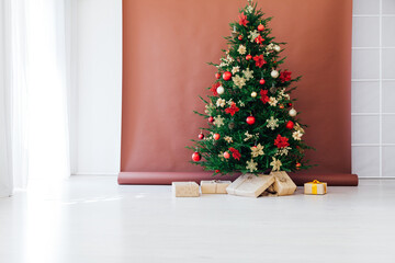 decoration decoration garland Christmas tree with gifts for the new year interior