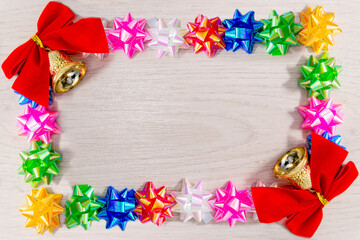 Colorful folded paper star with a Christmas bow, lucky star to use as frame