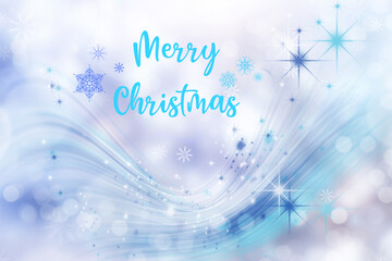 Winter snowy blurry background in light blue tones. Falling  abstract snowflakes in blur and inscription of Merry Christmas