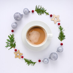 Obraz na płótnie Canvas Creative concept holiday celebration photo of christmas toys balls decoration with coffee cup on white background.