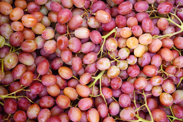 Ripe juicy red grapes background