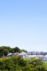 Fototapeta premium 住宅街と青空