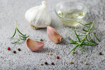 Garlic, rosemary and olive oil  ingredients for baking potatoes