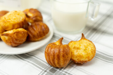 Brazilian snack cheese bread or pao de queijo in pumpkin shape