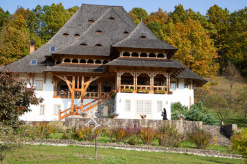 BARSAN, ROMANIA - OCTOBER 28, 2020: View of Barsana Wooden Monastery site in Maramures County, Romania.