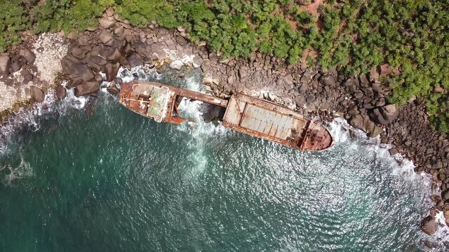 The rusty shipwreck run aground. Sri Lanka