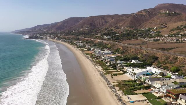 Drone flies over expensive beach homes in Malibu, USA