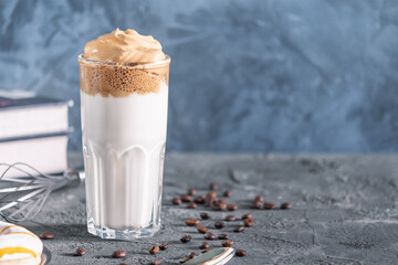 Delicious coffee drink, on a blue-gray background with copy space. Dalgon coffee.