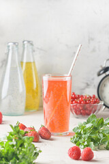 A glass of strawberry drink and basil seeds. Useful juice for diet or proper nutrition. Immune cocktail.