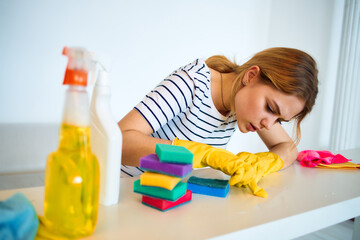 Woman cleans sponge table household cleaning service lifestyle