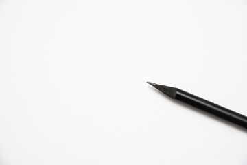 black graphite pencil on a white background