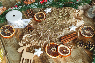 The Christmas accessories on wooden background
