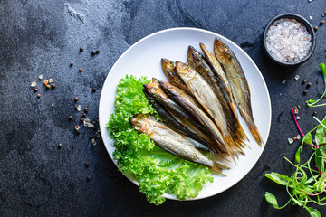 sardines sprats smoked or salted fish seafood mackerel meal on the table tasty serving size top...