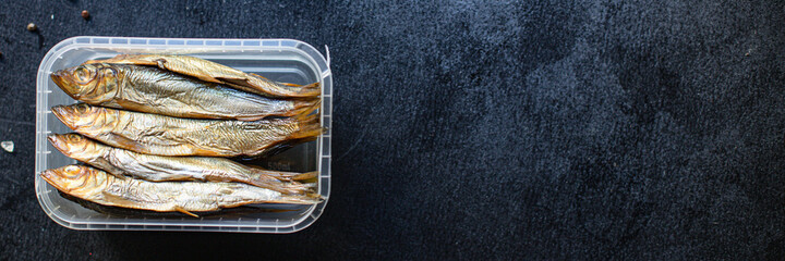 sardines sprats smoked or salted fish seafood mackerel meal on the table tasty serving size top...