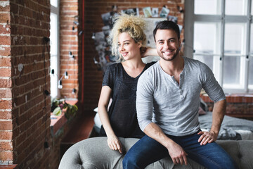 Obraz premium Happy cute couple at home. Good time together.