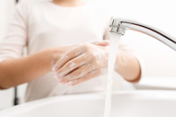Obraz na płótnie Canvas Washing hands with soap.