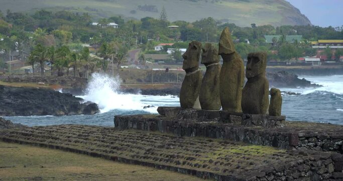 Row of Easter Island heads along coast, wide