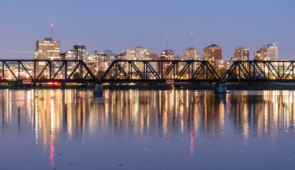 ottawa cityscape at dusk with prince of wales bridge