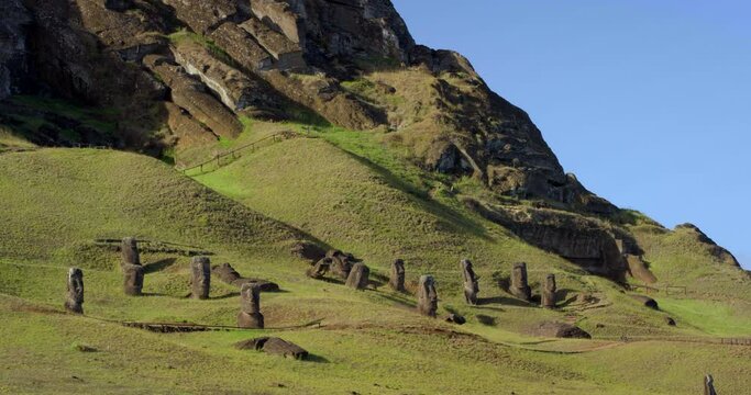 Wide, Easter Island statues on mountainside