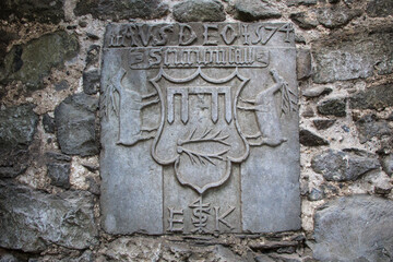 ROCK OF CASHEL, COUNTY TIPPERARY, IRELAND - SEPTEMBER 12, 2018: Detail on the wall inside Rock of...
