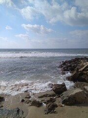 Fototapeta na wymiar Beautiful view of the stones and the Mediterranean Sea in summer in Israel.