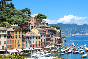 Fototapeta na wymiar Summer sea view of beautiful city on Liguria coast - Portofino, Italian riviera. 