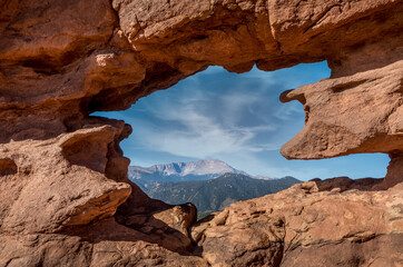 Pikes peakseen through the Siamese Twins Rock in the Garden of the Gods, Colorado Spring, Colorado