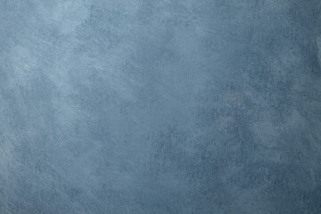 Modern abstract background in blue, canvas texture, place for text