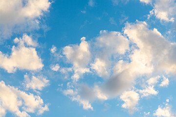 Obraz na płótnie Canvas White clouds on a perfect blue sky