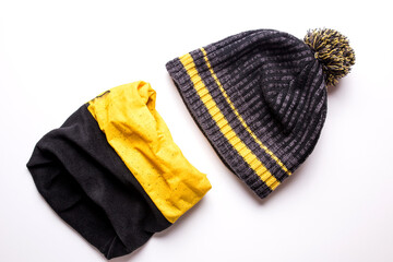Men's winter hat and bandana for winter sports on a white background.