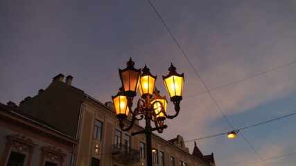 Fototapeta na wymiar yellow lamp light at night street