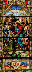 Jesus heals the sick stain glass